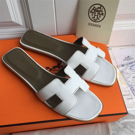 all white Hermes slippers